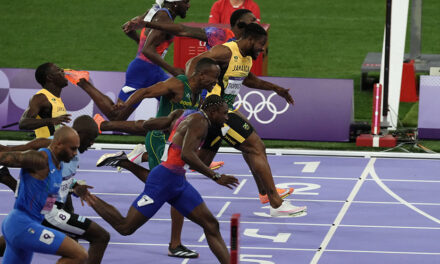 Late surge carries Noah Lyles to Olympic 100m gold